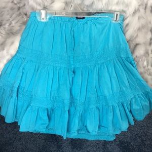 A blue, flowy skirt